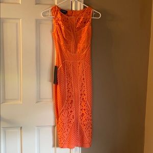 Bebe multi lace paneled midi dress